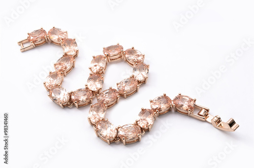 Tableau sur toile thin gold bracelet on a white background