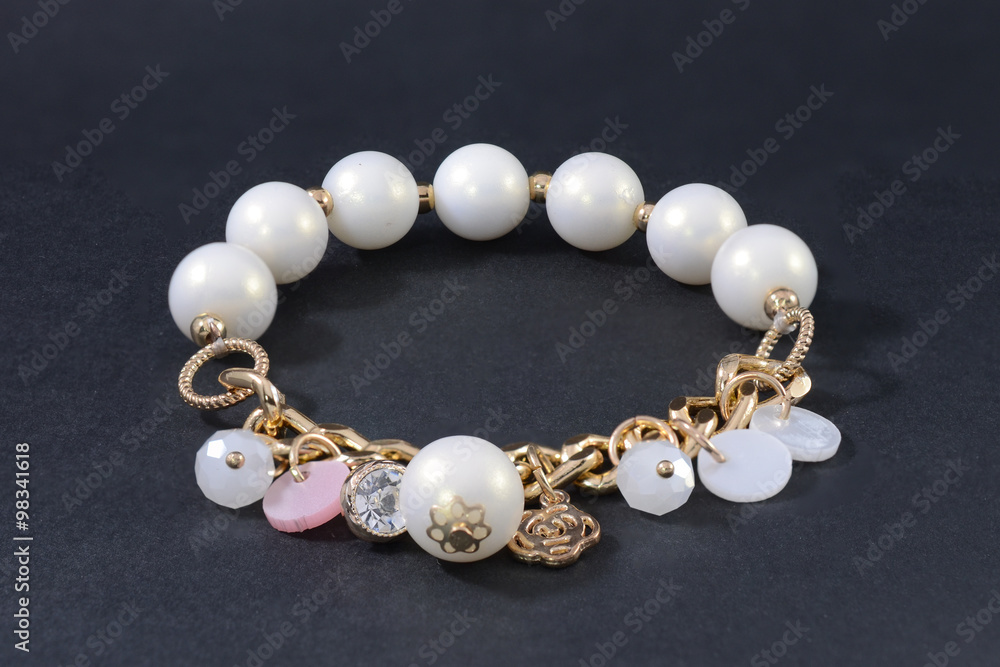 Bracelet of pearls isolated on black Bracelet of pearls isolated on black
