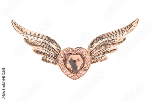 brooch in the form of a heart with wings on a white background