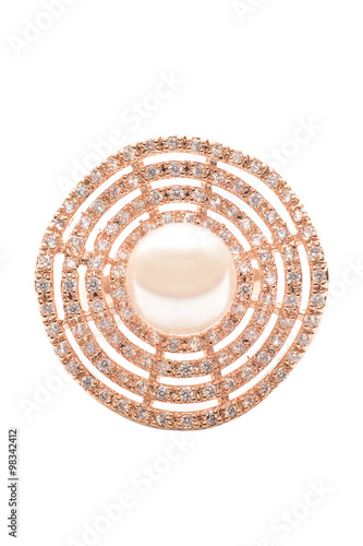 brooch with pearl on white background