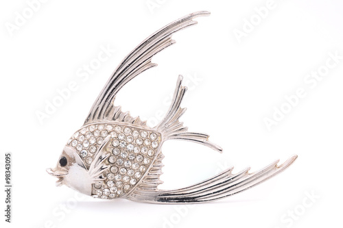 brooch in the form of a fish on a white background photo