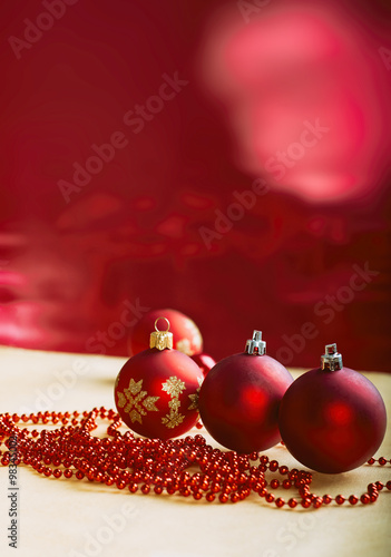 Christmas Composition. Red Baubles, Christmas Red Chain On Red Background