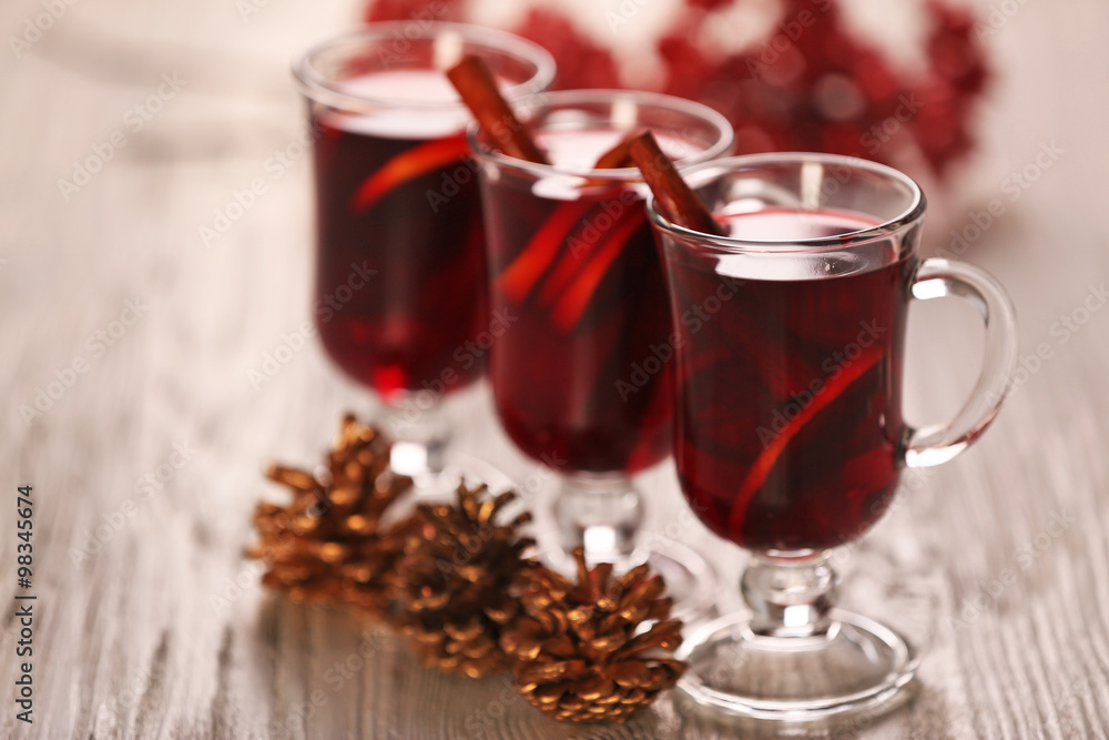 Mulled wine on wooden table Mulled wine on wooden table