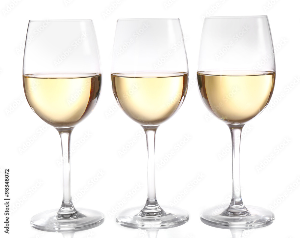 Three glasses of wine on light background Three glasses of wine on light background