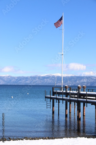 Travel: Lake Tahoe - beach with snow and flag © mbennett