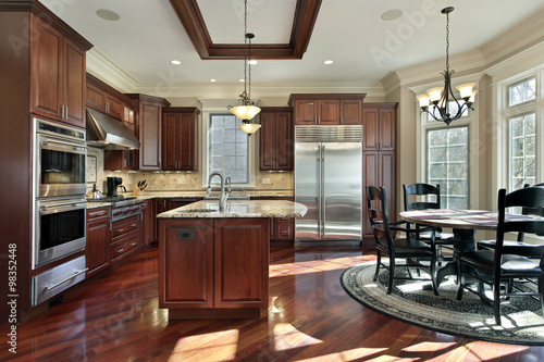 Luxury kitchen with cherry wood cabinetry