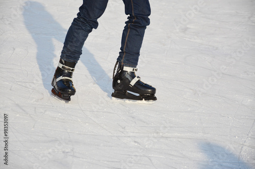 Young male ice skating