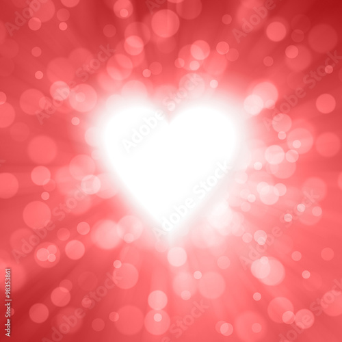 Motion and radial blurred shiny red color Valentine's Day Heart shape illustration background with copy space.