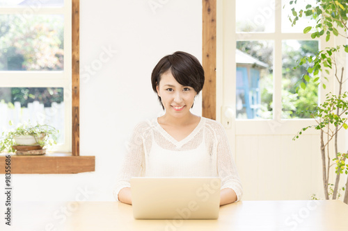 young asian woman using laptop Free Download young asian woman using laptop - GFXLoad
