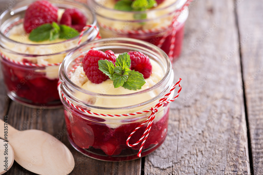 Colorful and delisious dessert in a jar berry cramble Colorful and delisious dessert in a jar berry cramble