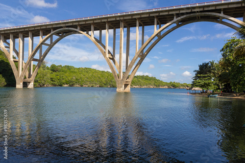   Bridge over a river with blue sky photo