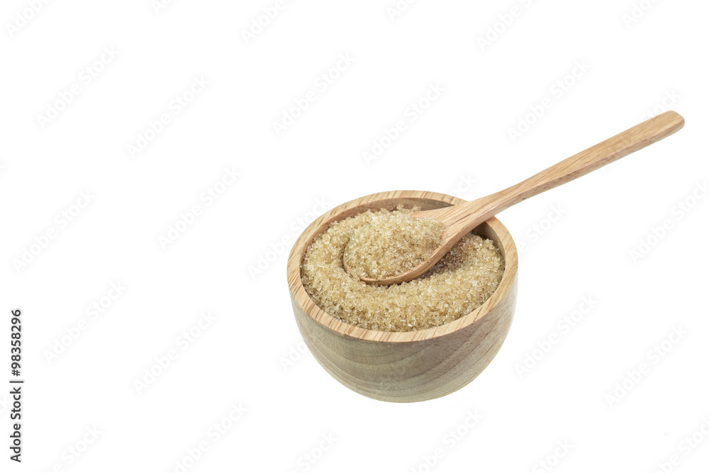 Close up of brown sugar in wooden bowl isolated on white Close up of brown sugar in wooden bowl isolated on white