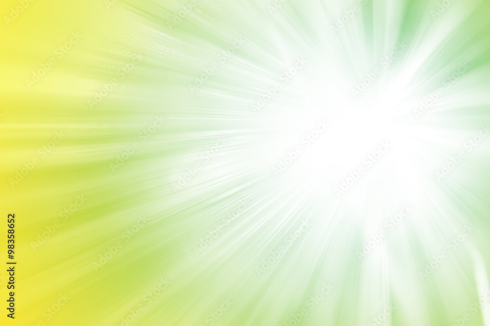 Obraz premium Green and yellow glitter sparkle defocused rays lights abstract background.