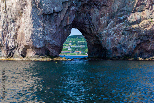 Perce Rock, Perce, Gaspe, Peninsula, Quebec, Canada Perce Rock is one of the world's largest natural arches located in water.