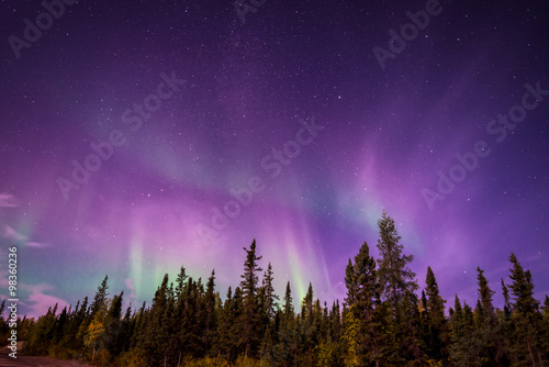 The amazing night skies over Yellowknife, Northwest Territories of Canada putting on an aurora borealis show.  photo