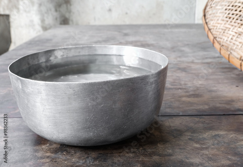 Thai water bowl on the wooden