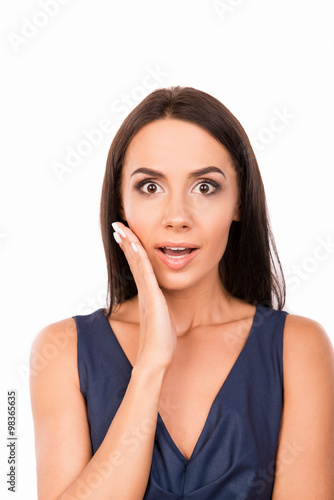 Portrait of surprised girl on white background