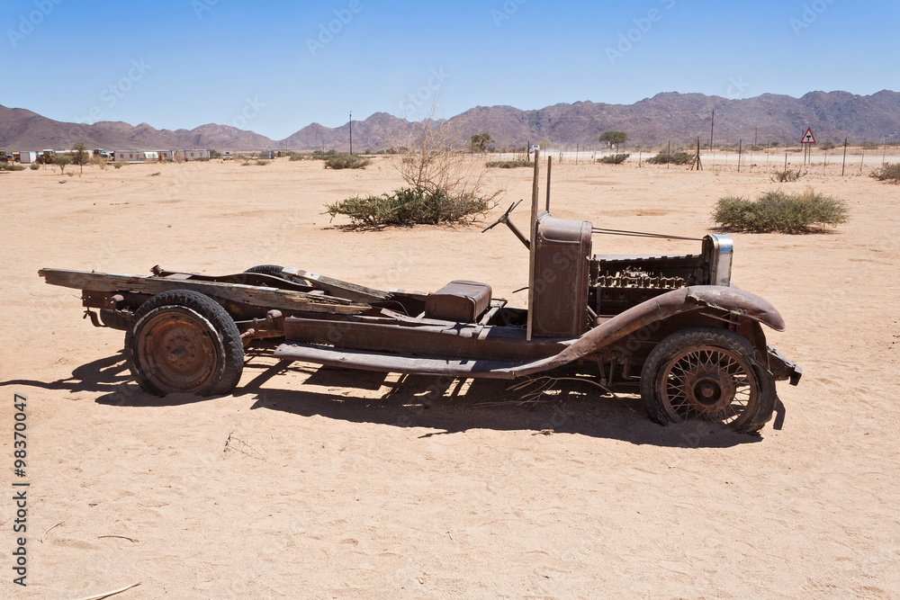 Old rusted car in front of the gas station Solitaire, Namibia Old rusted car in front of the gas station Solitaire, Namibia