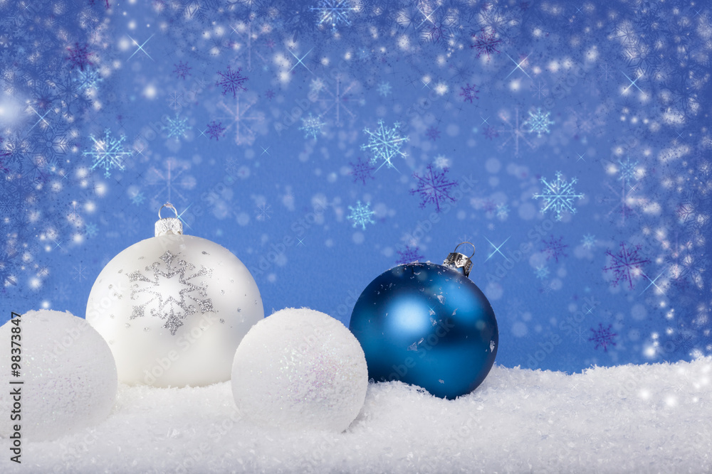 Blue Christmas balls in the snow Blue Christmas balls in the snow