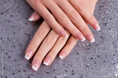 Manicure on a silver background.