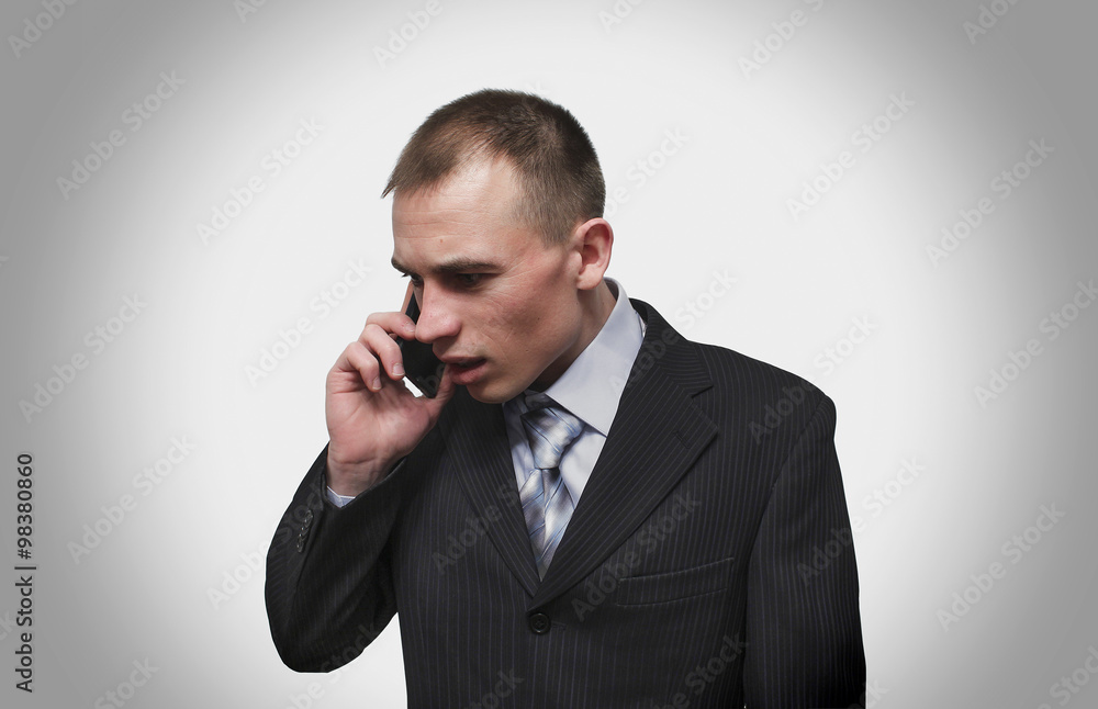 man talking on cell phone man talking on cell phone