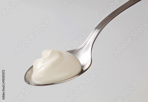 Photography White yogurt on a spoon