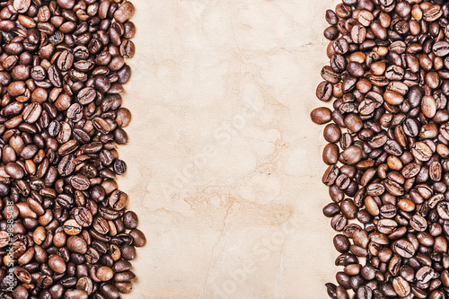 roasted coffee beans background and old paper