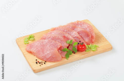 Raw turkey breast steaks