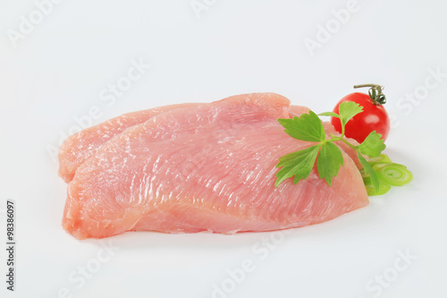Raw turkey breast steaks