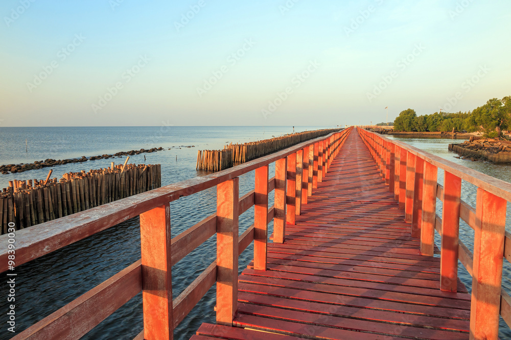 Wooden bridge to the sea