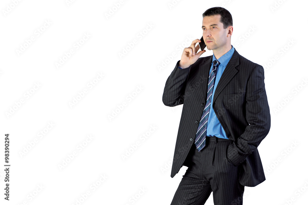 Man in a suit talking on the phone Man in a suit talking on the phone