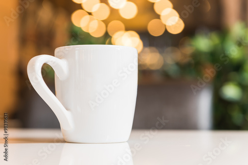 white coffee cup in coffee shop
