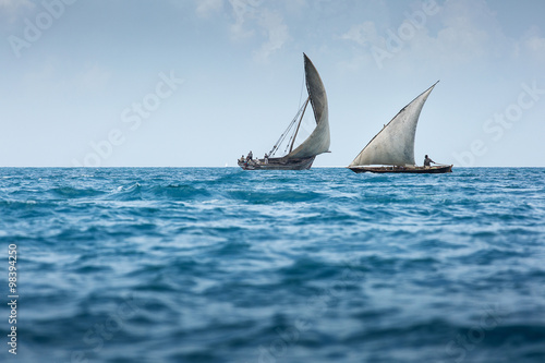 Obraz na plátně Dhow wooden fisher boat on the Indian Ocean near Zanzibar, Tanza
