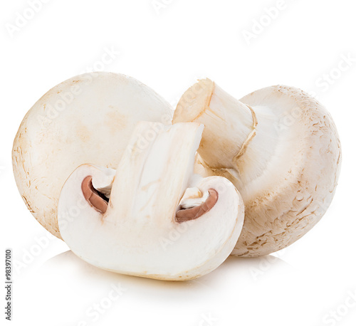 Champignon mushrooms close-up isolated on a white background.