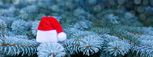 Christmas background and red Santa hat.