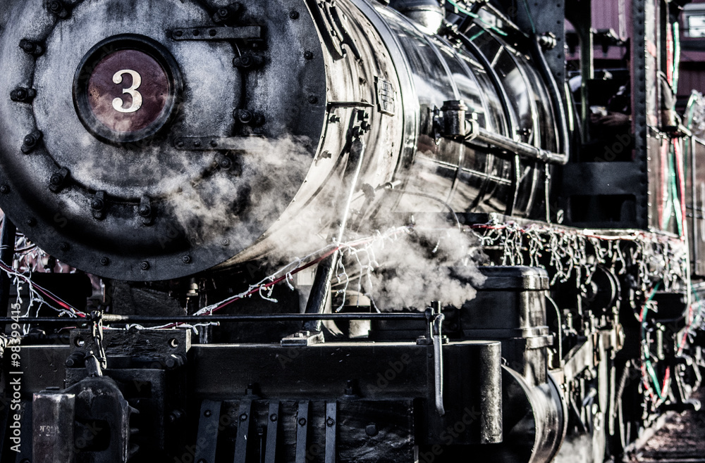 Naklejka premium Detail of steam train engine, transport and heavy industry