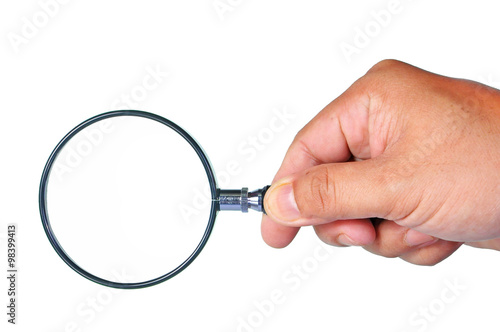 Hand hold magnifying glass isolated on white