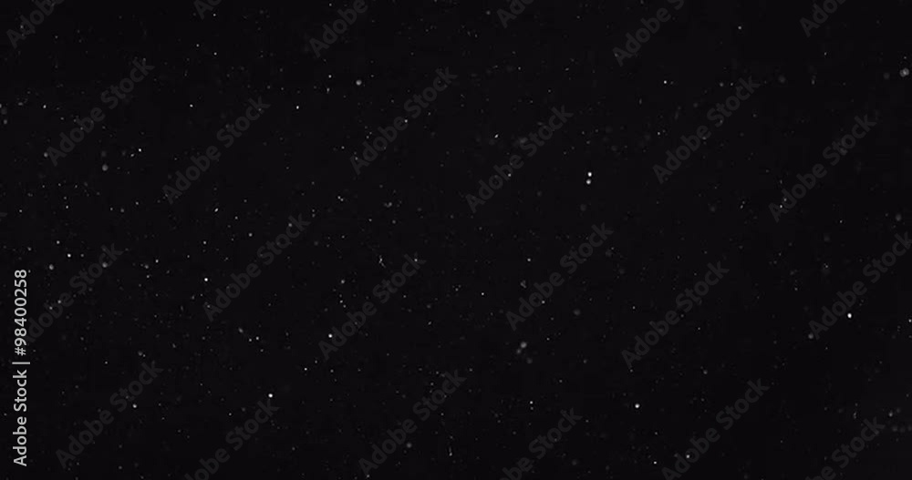 Particles floating in water. Perfect for compositing.