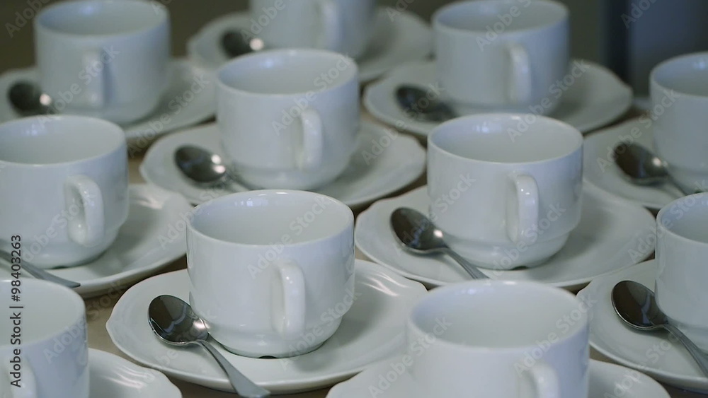 Many White Tea Cups in Table Many White Tea Cups in Table