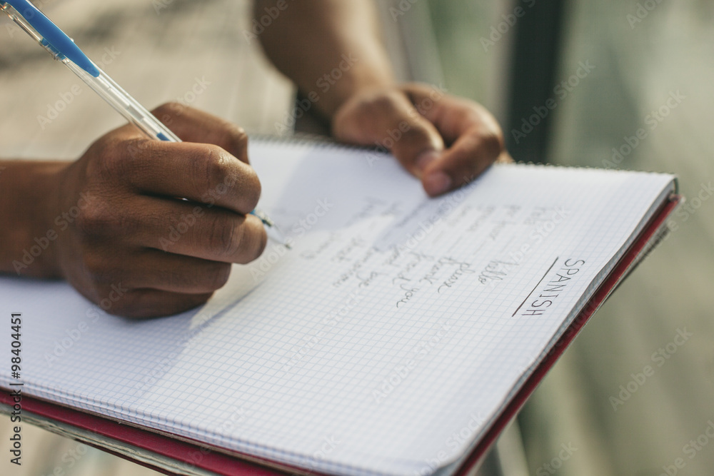 Young Afro-American man studying language Young Afro-American man studying language
