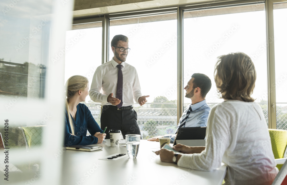 Businessman having a presentation in conference room Businessman having a presentation in conference room