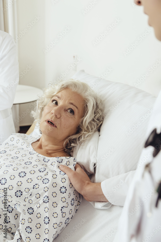 Senior woman in hospital looking worried Senior woman in hospital looking worried