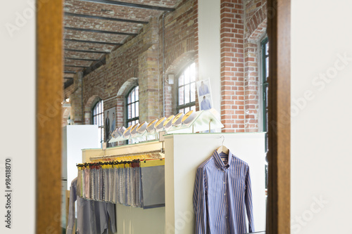 Germany, Berlin, Interior on men's tailor shop, fabric samples and shirt in mirror photo