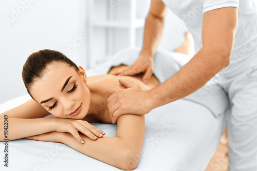 Spa Woman. Massage Procedure In Beauty Spa Salon. Body Care.