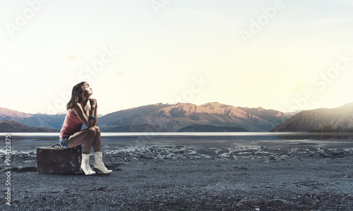 Pretty brunette retro hitchhiker