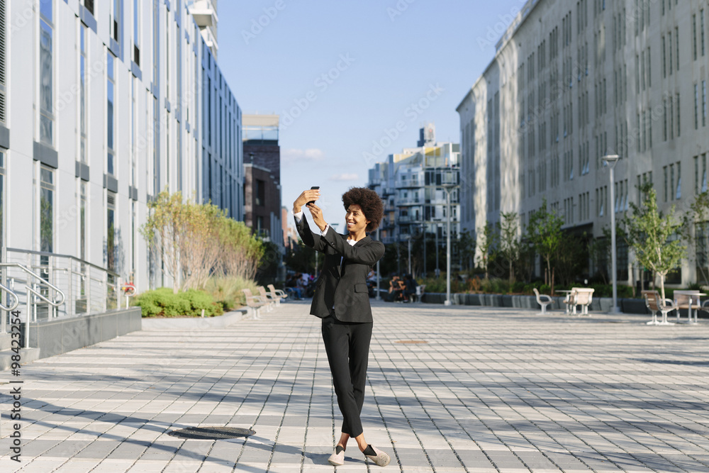 USA, New York City, businesswoman taking a selfie USA, New York City, businesswoman taking a selfie