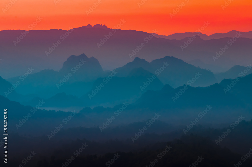 Colorful multi colors of silhouette mountain and sky at twilight