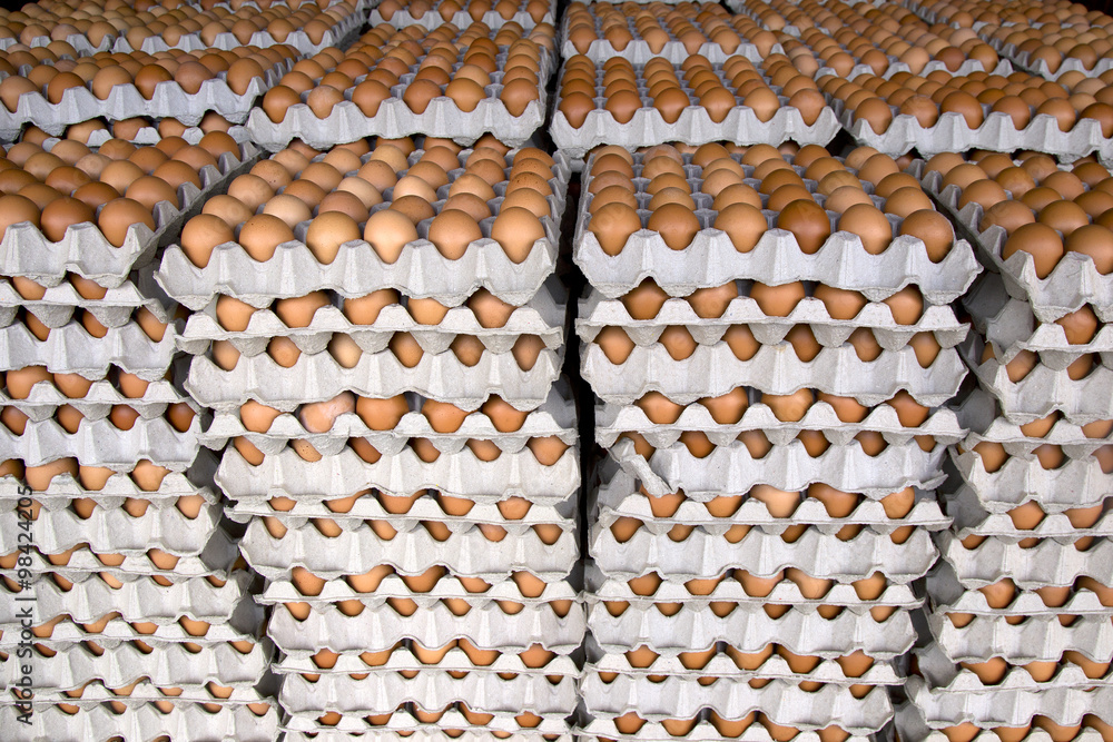 stack of eggs, many of eggs, bunch of eggs, eggs in container