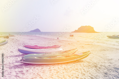 Fototapeta Naklejka Na Ścianę i Meble -  kayak on the beach made with color filters, Soft Focus