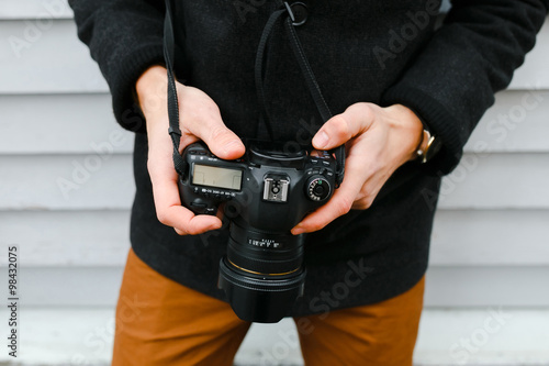 Photographer on walk with a professional camera